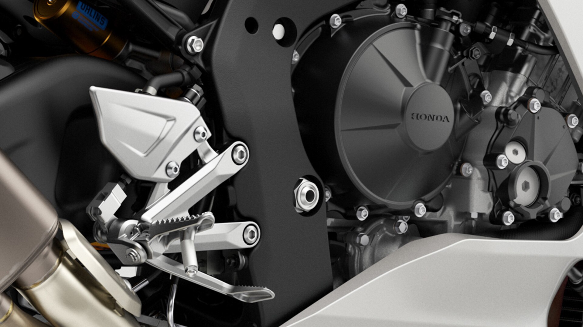 Close-up of liquid-cooled inline four cylinder engine and cam lobes.